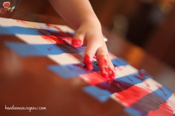 Toddler Tape Resist Painting for Candy Canes!
