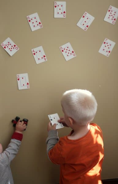 Playing cards set up for a number match game