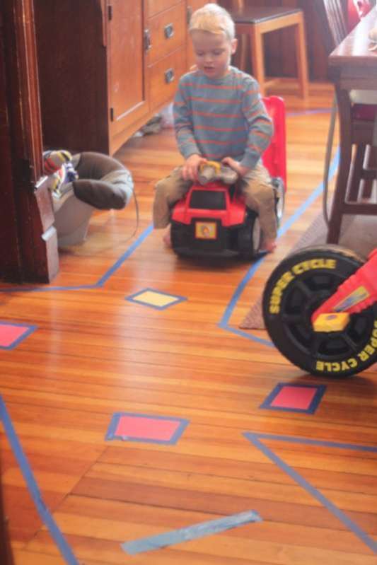 This easy setup tape road race track is perfect for toddlers who like things that go! Bonus, let them help with clean up for fine motor fun.