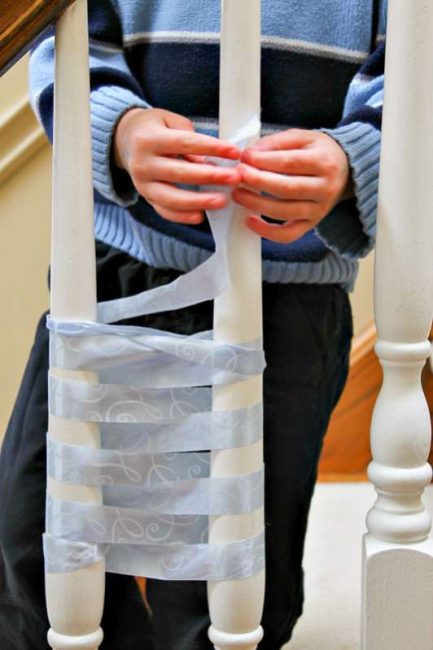 A big way to teach kids to weave using the staircase