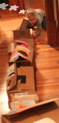 Make a train with cardboard boxes.