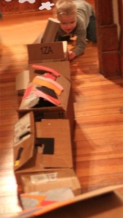 Make a train with cardboard boxes.