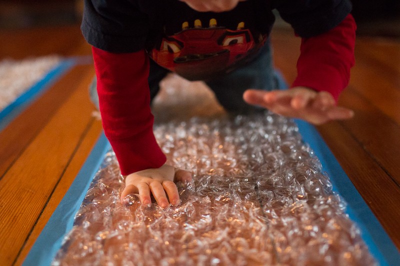 Make A Bubble Wrap Runway | Rainy Day Activities | 32 Fun Things For You And Your Kids To Do Indoors
