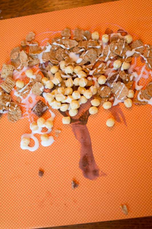 Super simple fall tree craft for your kids to make with cereal.