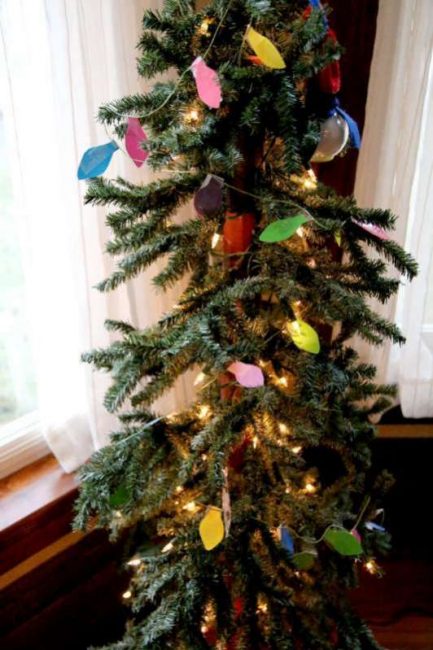 Christmas lights string put on the Christmas tree