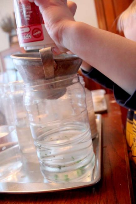 Invite your preschooler to see if sprinkles will dissolve in water.