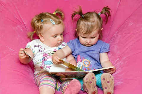 http://www.dreamstime.com/royalty-free-stock-photography-two-toddlers-reading-together-image20778707