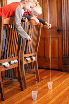 What string do you think will be the easiest to get into the cup? A long one or a shorter one? Amazing coordination activity for kids