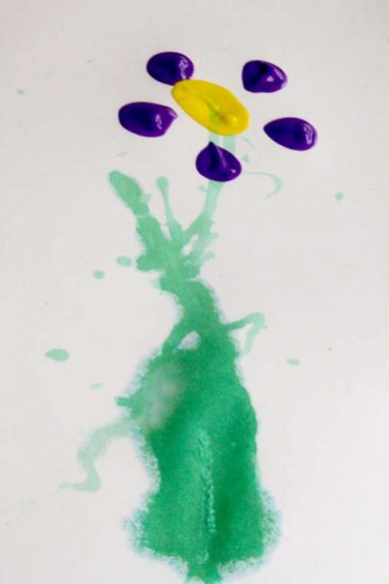 A creative spring flower art project for kids to make - straw painting and bottle prints! Fun!