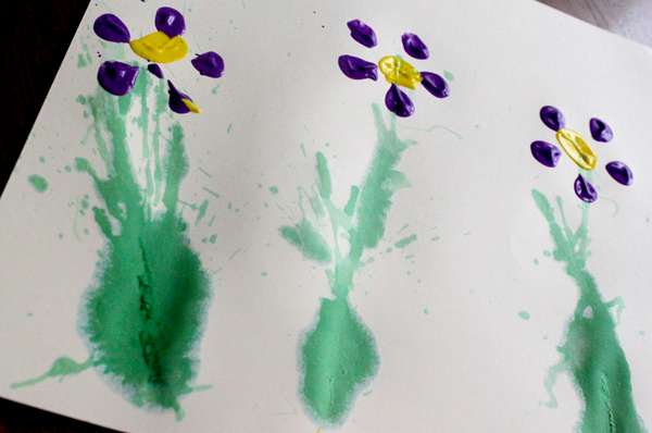 Spring Flower Art Project for Kids to Create -- bottle prints and straw blown stems