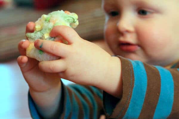 Edible sensory play with frozen veggies for babies and toddlers. So simple!