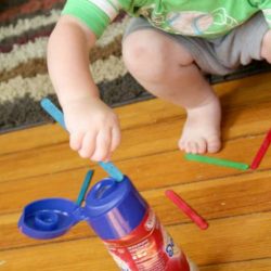 A fine motor activity to keep toddler busy using a plastic bottle