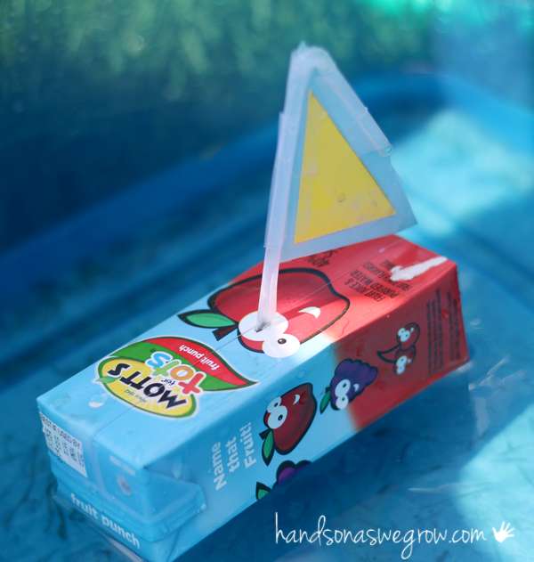 Boat craft for kids to make from juice boxes and a paper/ scotch tape sail