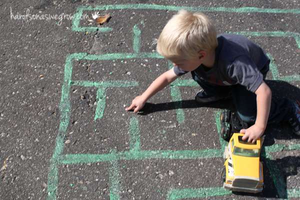 Your preschooler will love to drive cars and trucks around their big chalk maze!