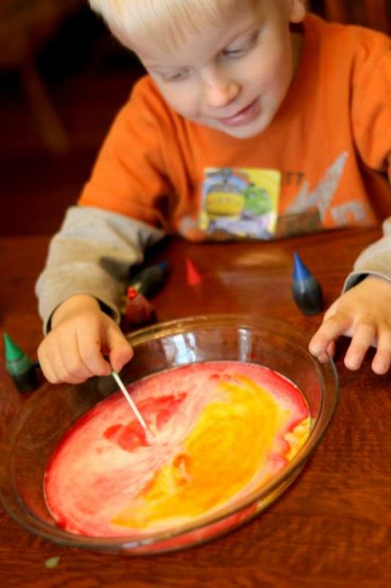 Magically make orange with the color changing milk experiment!