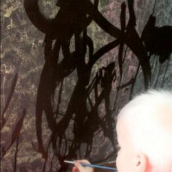 Painting with water is an easy starter painting activity, great for toddlers