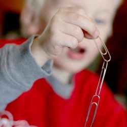 Quick paper clip craft for the kids to make is a simple paper clip chain - hooking the paper clips together is great for fine motor!