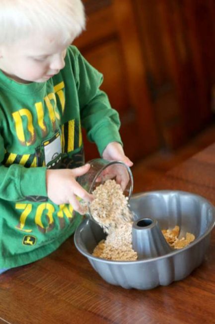 Pouring the food into the mold is a great fine motor activity!