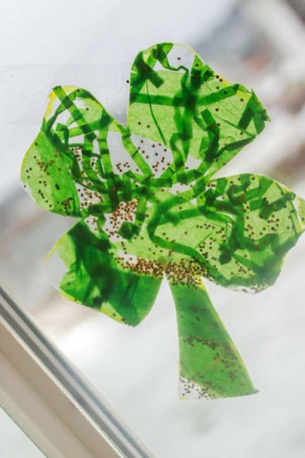 Easy shamrock suncatcher for toddlers to make to hang in the window