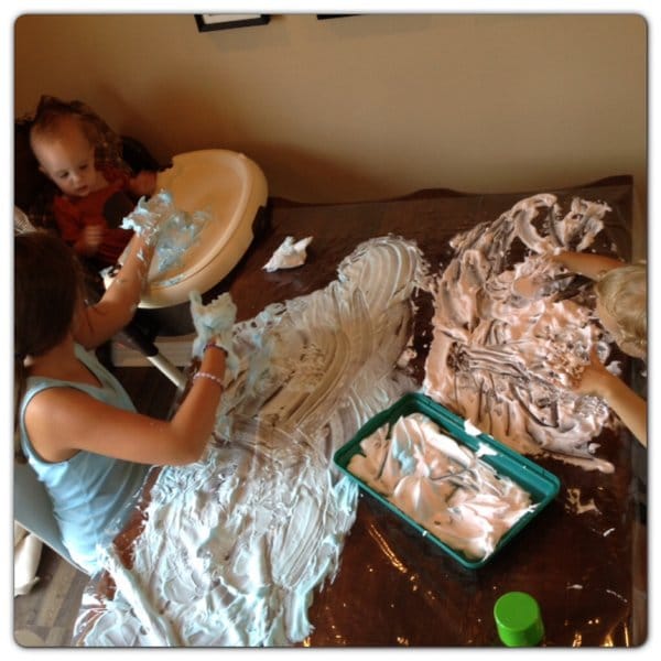 Siblings get messy together! 1 of the 5 Activities to Help Strengthen Sibling Relationships.