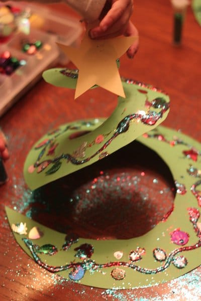 A spiral Christmas tree craft for kids to decorate and make