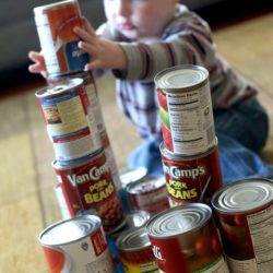 Stacked canned food as blocks for toddlers