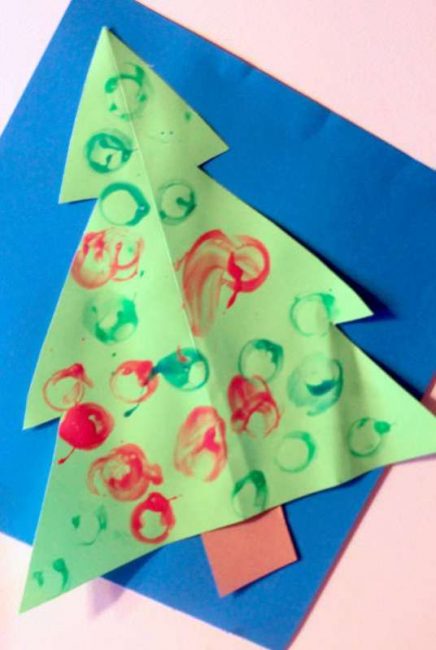 Decorate a Christmas Tree with painted ornaments