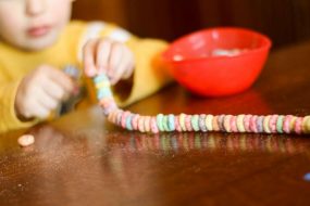Thread a Fruit Loop Necklace - Hands On As We Grow®
