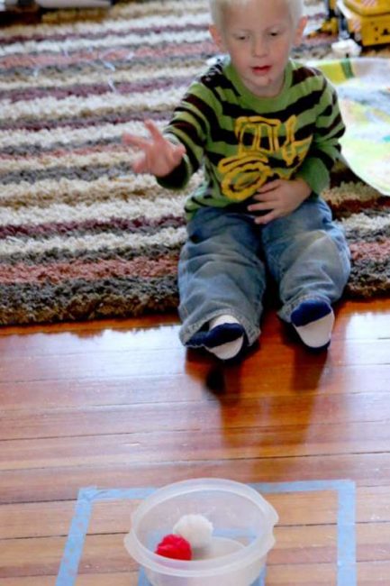 Throwing practice for preschoolers using pom poms