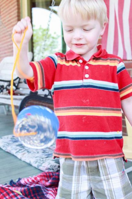 Even before you string your homemade wind chimes, it's fun to swing them around and hear the sounds.