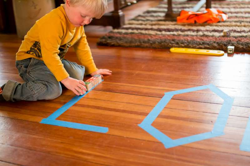 Tracing lines with objects. Toddler style.