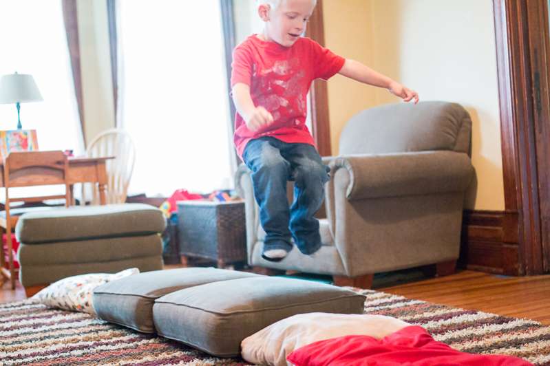 Indoor gross motor fun! Walking on pillows. (Great for a rainy day)